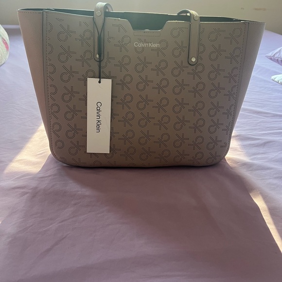 Calvin Klein Handbags - Calvin Klein Tan Tote Bag with Spacious Design
